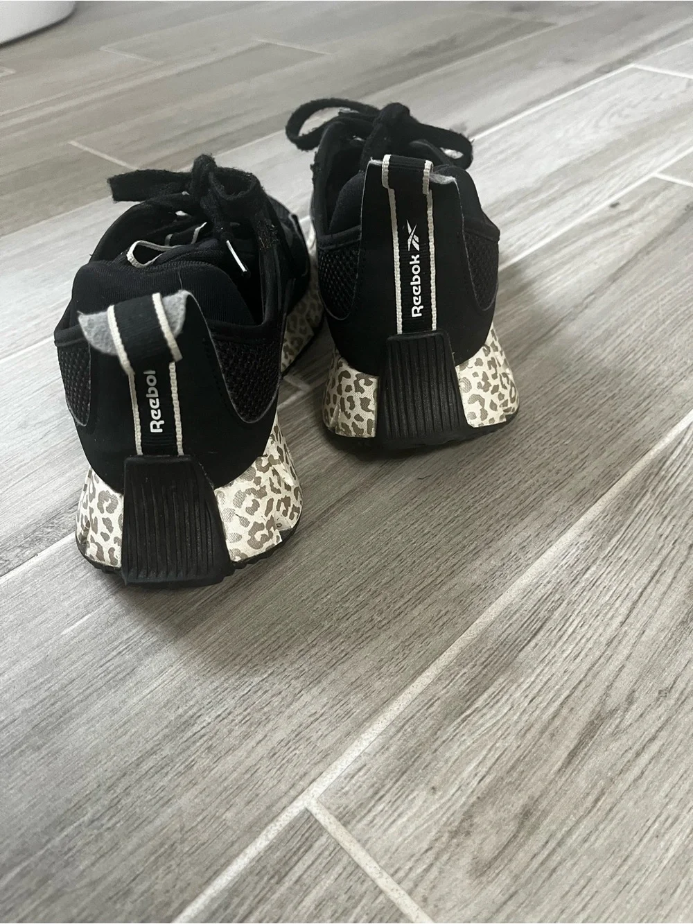 Reebok Black Athletic Sneakers with Cream Leopard-Pattern Sole